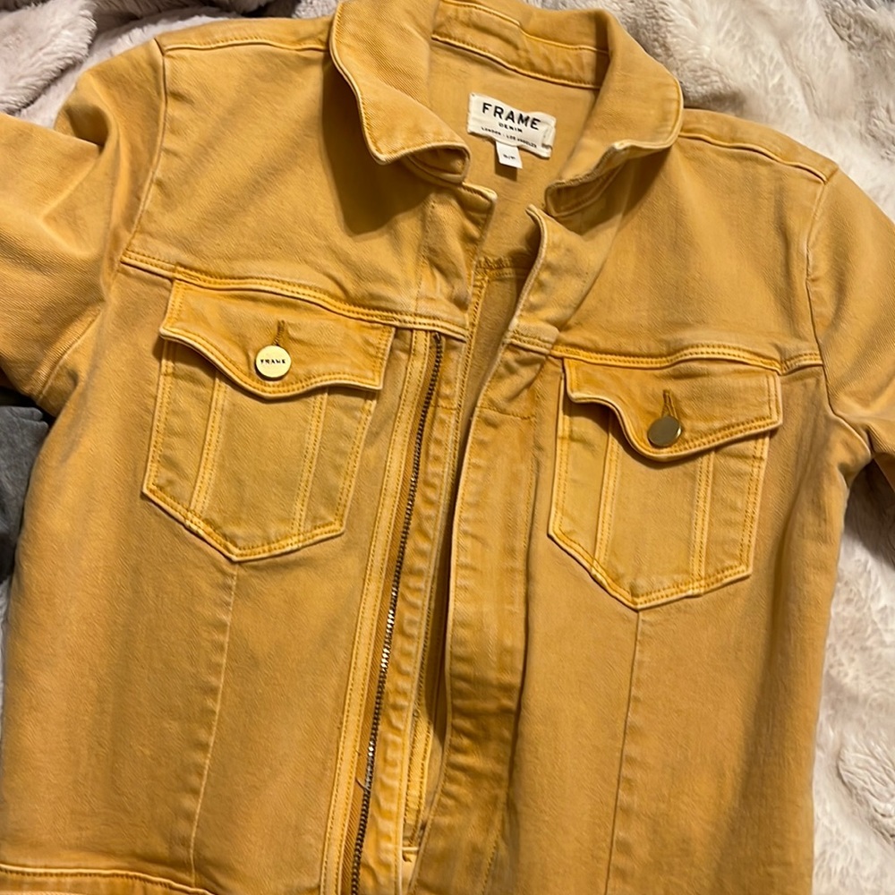 Frame jumpsuit - great co Siri on but has some staining on the knee area
